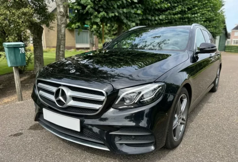 Black Mercedes-Benz E-Class estate car